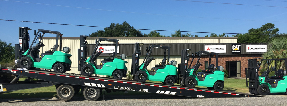 truckload of new Mitsubishi 5,000 lb forklifts