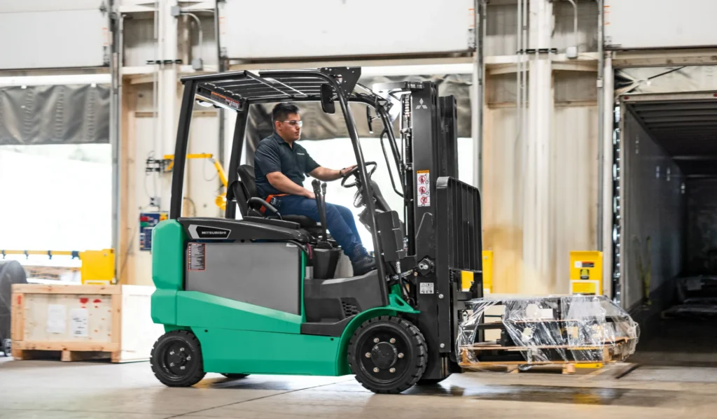 FBC20Q-FBC40Q Mitsubishi forklift lifting and driving a large box