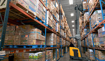 Jungheinrich ETR230 Forklift being used in a warehouse.