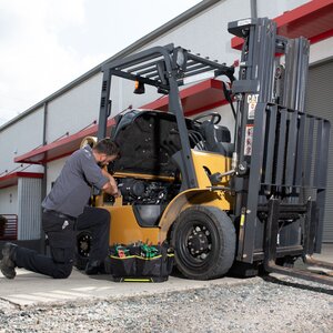 G&W Equip tech working on forklift