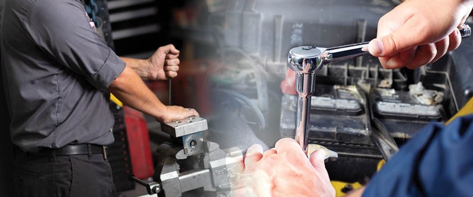 Forklift technician fixing a forklift to ensure safety while operating.