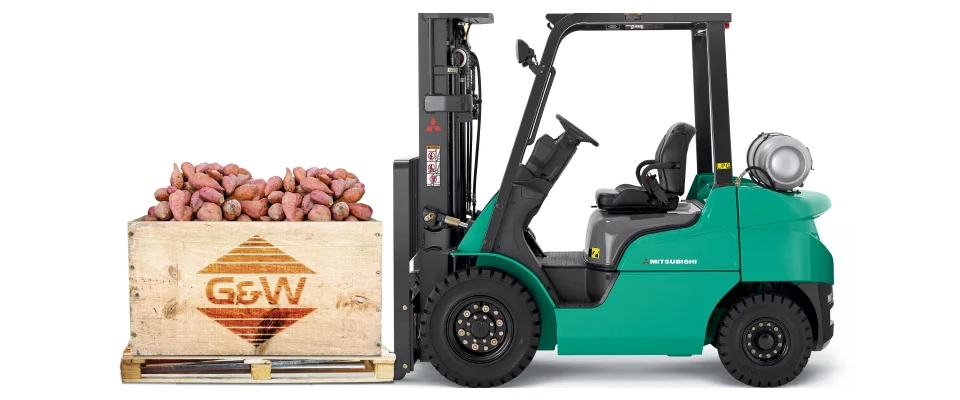 Forklift moving palletized produce for seasonal sweet potato farming operations